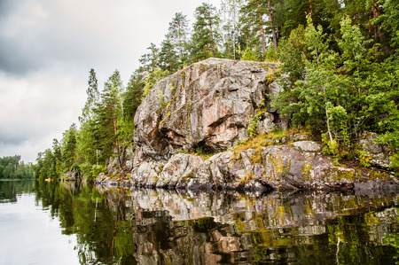 a big stone on the shoreの写真素材