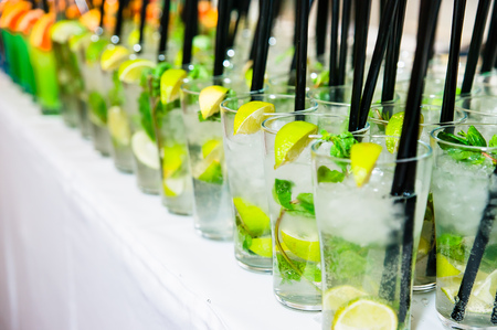 a row of Mojito glasses at the corporate partyの写真素材