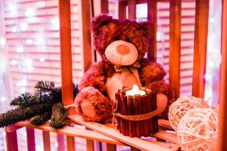 Teddy bear with a candle Christmas decorationの写真素材