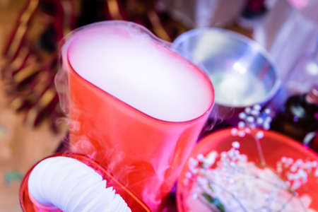 A bowl of steam in a chemical laboratory. A set of containers and tools for scientific experimentsの写真素材