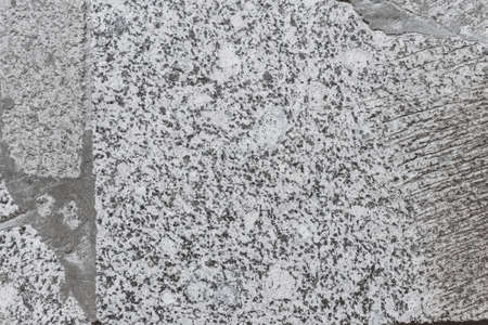 a textured background of granite slabs in concrete. soviet floor designの写真素材