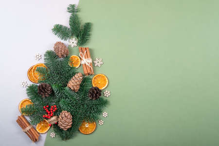 Beautiful, natural, reusable and zero waste composition of christmas objects with fresh pine branches.の写真素材