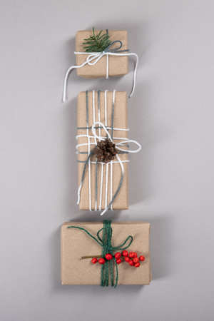 Beautiful, natural, reusable and zero waste packing of three presents.の写真素材