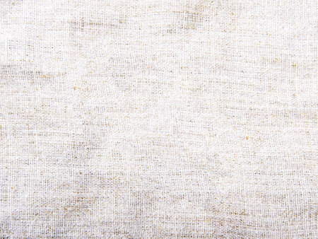 The beautiful beige background of the closeup bagging. Selective focus.の写真素材