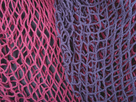The multicolor background of the zero waste string bags for fruits, vegetables, grocery or other...