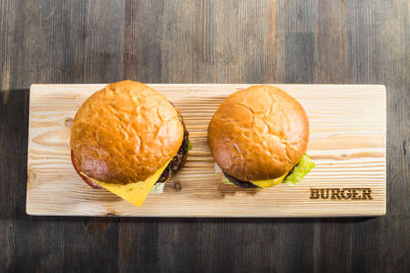 Crafting a burger on the supply board closeの写真素材