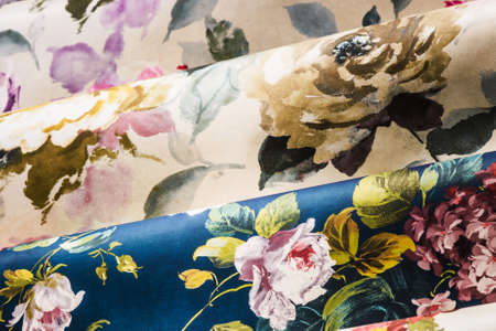 Rolls of different kinds of wallpaper close another viewの写真素材