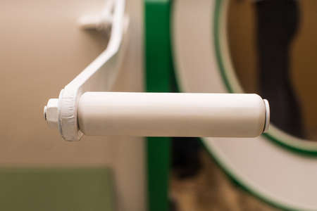 Exterior of hyperbaric recompression chamber. A hyperbaric chamber is a compartment in which air pressure is much higher than normal. Medical use in decompression accidents. Door opener.の写真素材