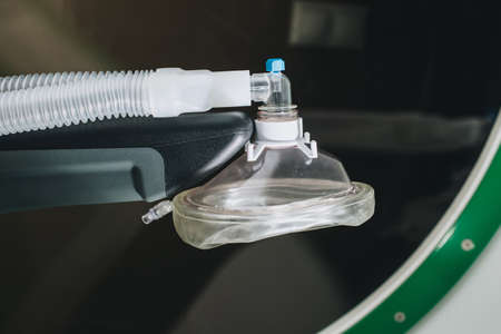 Mask for breathing oxygen lies on the armrest of the altitude chamber close