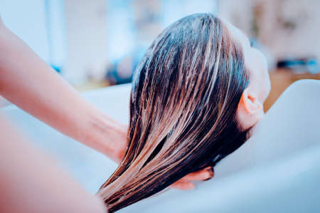 girl in a beauty salon, wash hairの写真素材