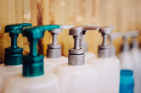 Bottle of liquid soap, shower gel or shampoo. Toned image. Shampoo bottle with dispenser. close up viewの写真素材