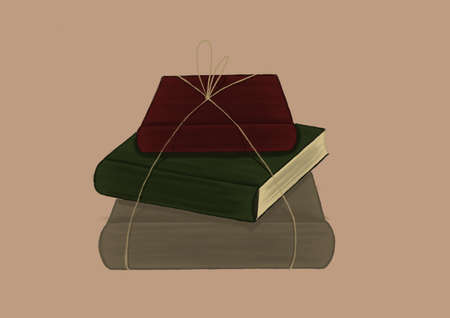 books with ribbon on beige backgroundの写真素材