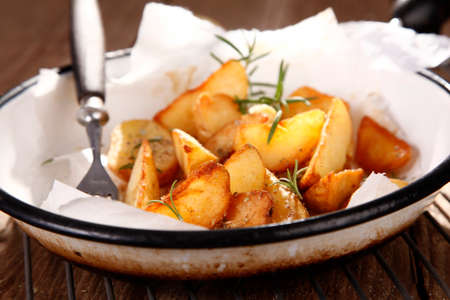 Baked potatoes with thymeの写真素材