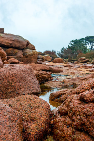 Pink Granite Shoreline in Brittany, France.の写真素材