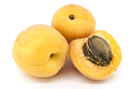 Apricots isolated on white background close upの写真素材