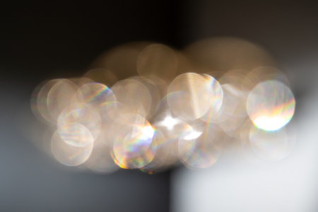 bright sparkling sequins texture, abstract background with bokeh lights, circle led light, blurred christmas lights, magic of optic viewの写真素材