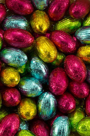 Close up of brightly coloured easter eggs.