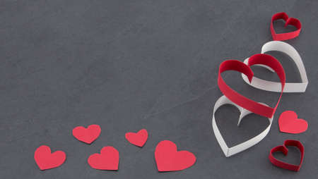 Assorted hearts slate background
