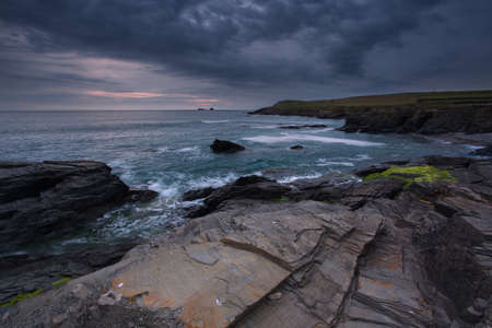 Moody skies at Boobys bay Cornwall Ukの写真素材