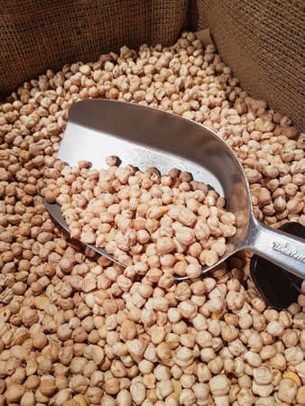 Ð¡hickpeas with a ladle in the store Food backgroundの写真素材