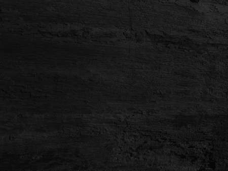 Old dark black and white vintage rustic aged antique wooden panel background textureの写真素材