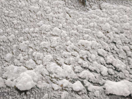 Texture of fresh snowy cloth Winter snow texture backgroundの写真素材