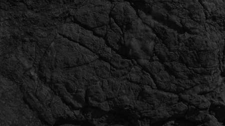 Dark background close up texture of natural stoneの写真素材