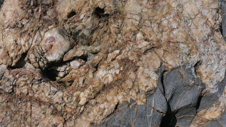 Dark background close up texture of natural stoneの写真素材