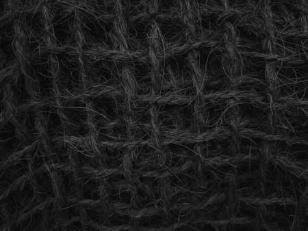 Closeup detail of black fabric texture background. High resolution photo.の写真素材