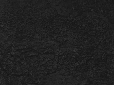 Black wall texture background. Close up of grunge black wall texture.