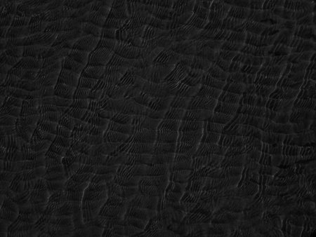 Black textured background. Close up of black textured background.の写真素材