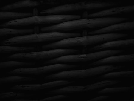 Black wicker texture. Wicker basket background. Close-up