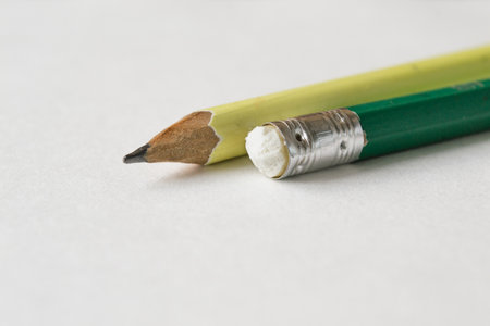 Pencil with eraser on a white background. Close up.の写真素材