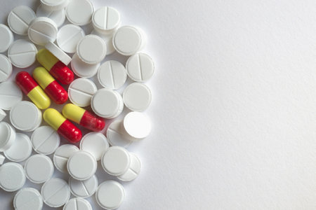 Pills on white background with copy space. Medicine and healthcare concept.の写真素材