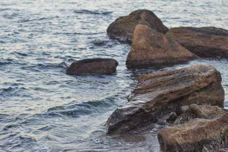 Rocky coast of the sea in the evening. Landscape.の写真素材