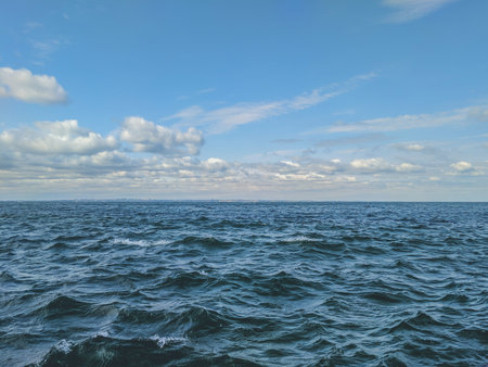 Beautiful seascape. Sea and blue sky with clouds.の写真素材