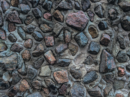 Background of stone wall texture. Selective focus. Toned.