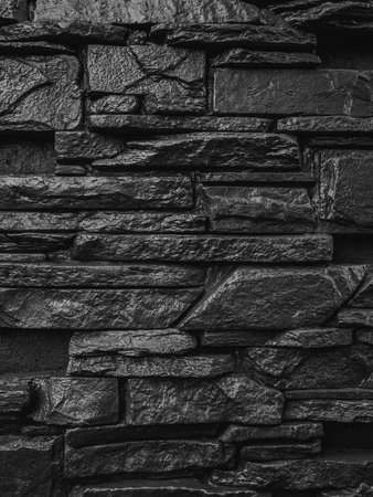 Black stone wall texture. Black stone wall background. Black stone wall texture.の写真素材