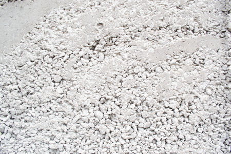 white pebbles on the floor as a background, texture.
