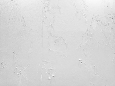 White painted wall texture. Abstract background for design with copy space.の写真素材