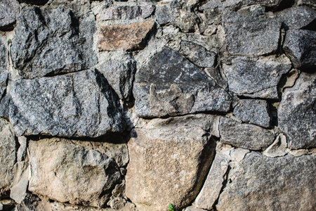 Background of stone wall texture. Closeup of stone wall texture.