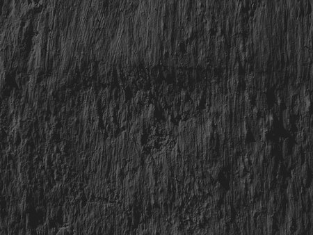 Dark grey black slate background or texture. Close up of stone surface.の写真素材
