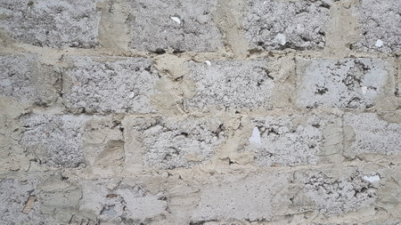 Texture of old gray brick wall for background and design art work.の写真素材