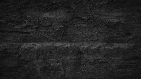 Black grunge brick wall texture background. Close up of black stone wall.の写真素材