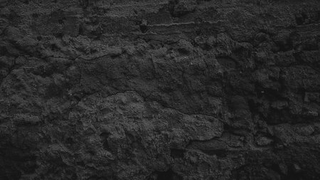 Black stone wall texture background. Abstract grunge black and white wall textureの写真素材