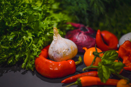 Fresh vegetables on a black background. Healthy food. Selective focus.の写真素材