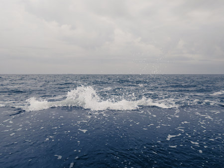 Splash of water from the boat in the seaの写真素材