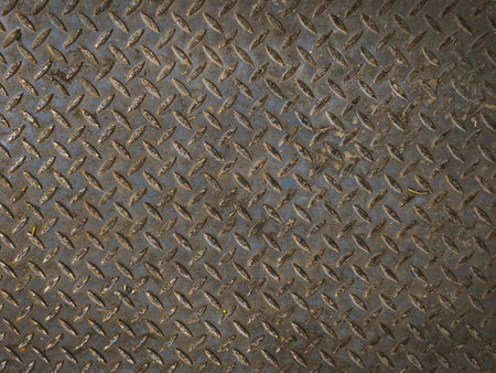 grunge metal plate with rhombus pattern. background and textureの写真素材