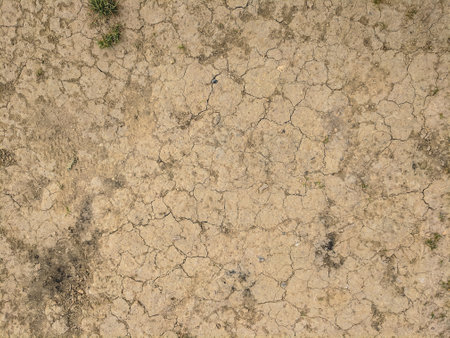 Dry and cracked earth background. Global warming, climate change conceptの写真素材