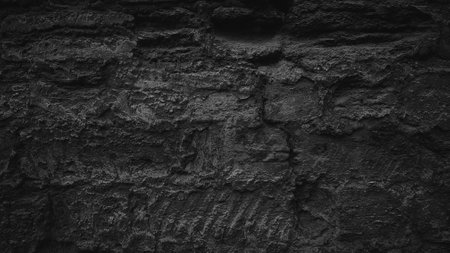 Black stone wall texture. Abstract background and texture for design. Black and white.の写真素材
